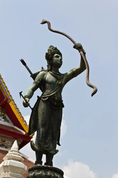 Statue of vishnu holding weapon