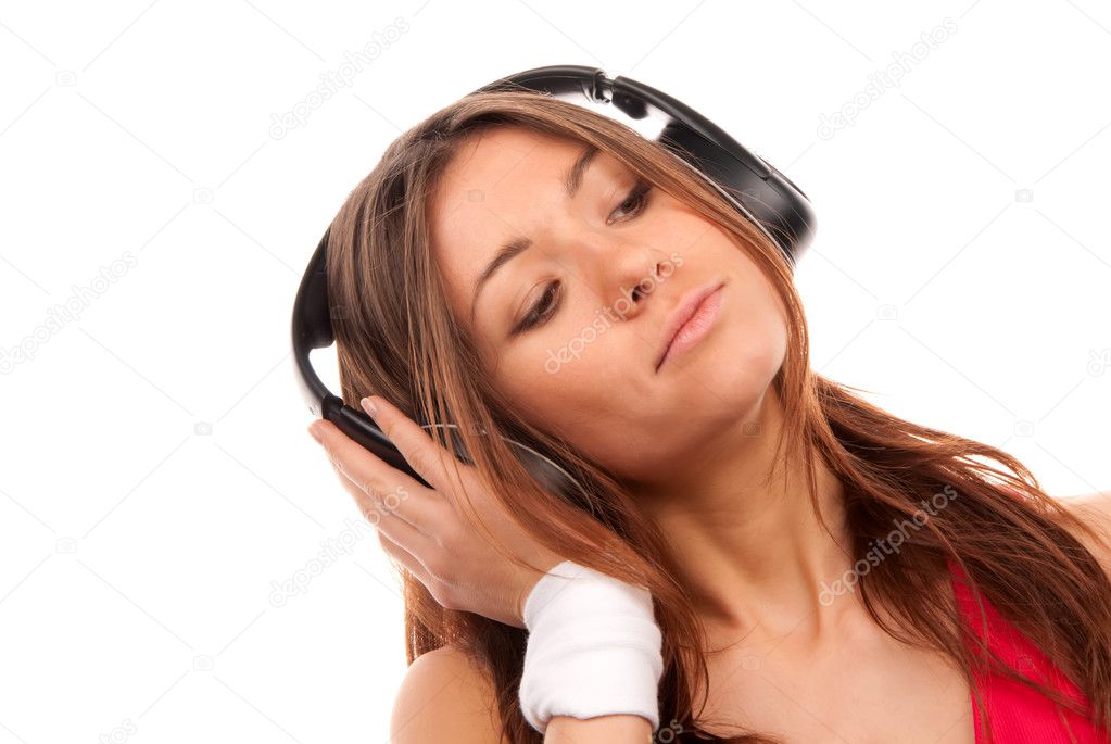 Pretty young woman listening music on her new cellular touch mp3 player in big headphones wearing dance pink top, isolated on white background — 님의 사진 ... - depositphotos_4749041-Young-woman-listening-music-in-big-headphones