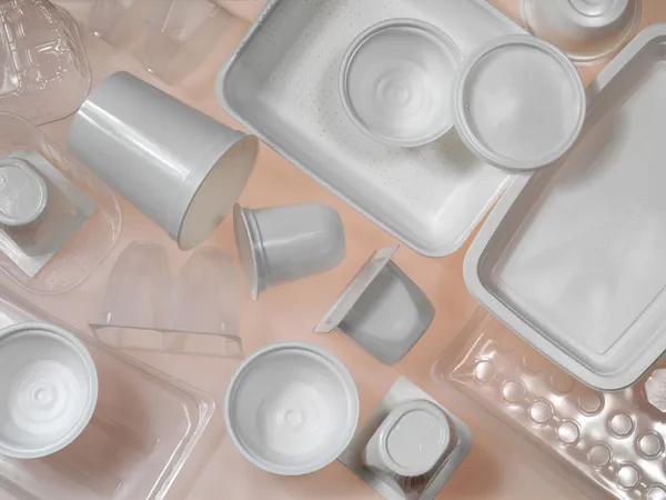 Containers of plastic and polystyrene