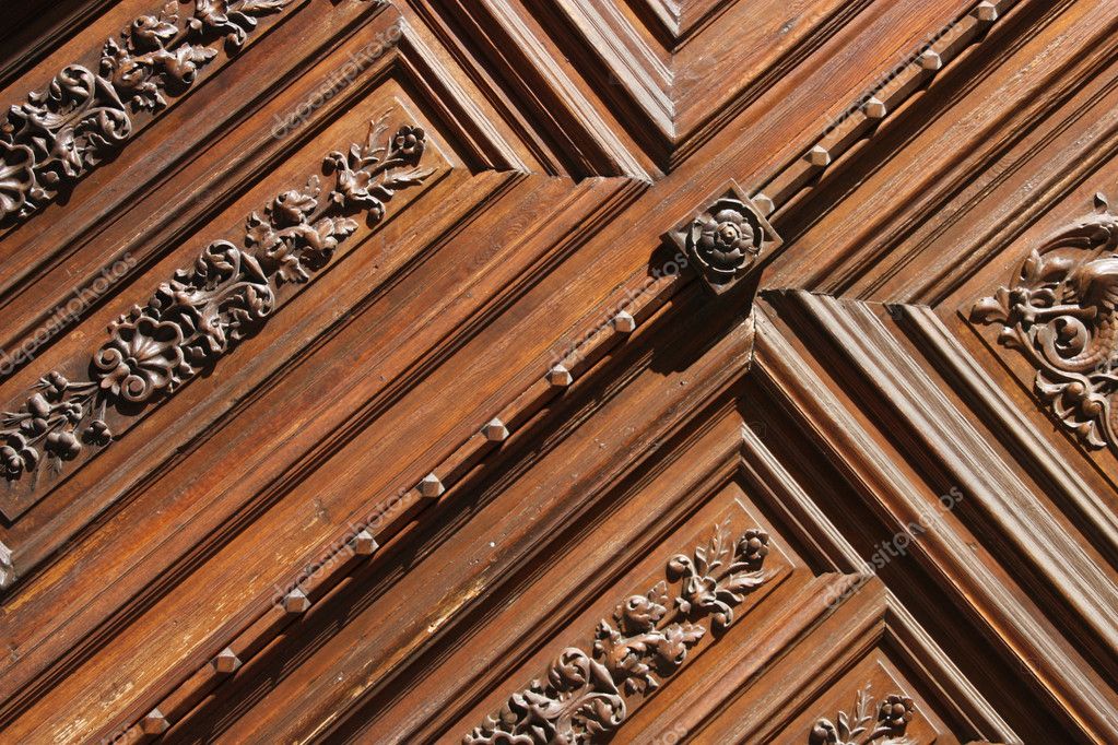 Wooden door carved decoration. Dramatic