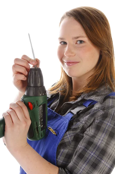 Young crafts woman with cordless screwdriver