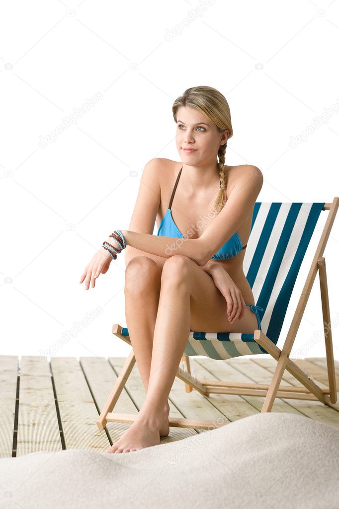  sitting on deck chair — Stock Photo © CandyBoxImages #4682031