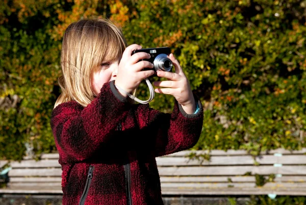 Child photographer photographing taking photo
