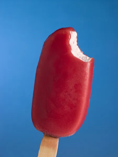 Red Ice Block With A Bite Taken