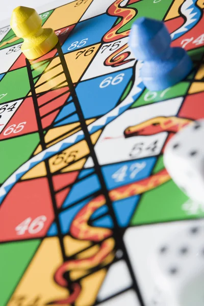 Close -Up Of Snakes And Ladders Board
