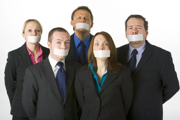 Group Of Business With Their Mouths Taped Shut