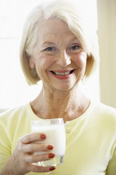 Senior Woman Drinking Milk