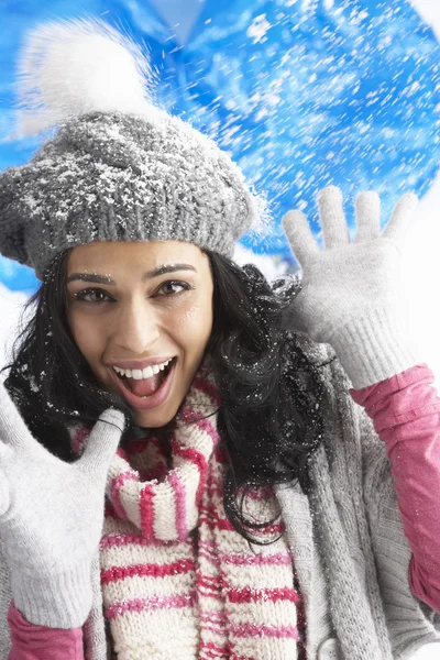 dep 4837714 Young Woman Wearing Warm Winter Clothes And Hat Being Hit