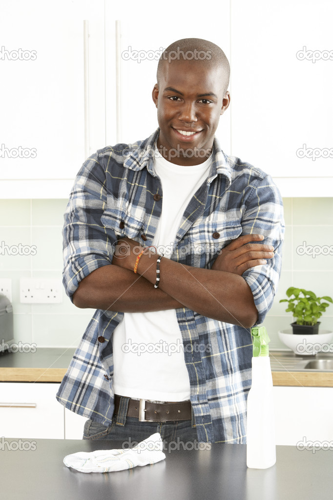 Man Cleaning Kitchen