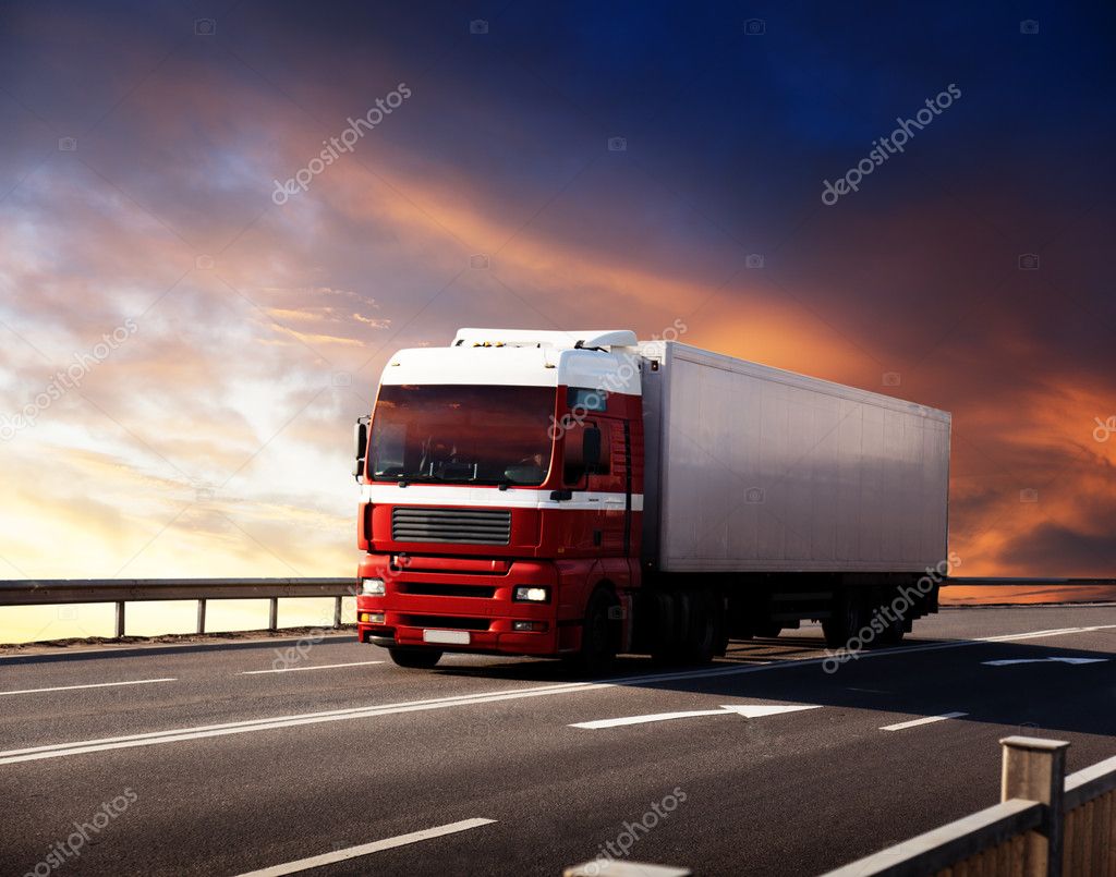 Truck on highway and sunset \u2014 Stock Photo \u00a9 Iakov 4494762