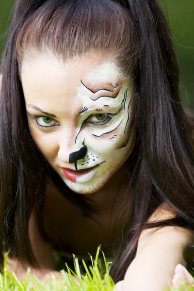 Woman with tigress face art portrait by Andrey Guryanov Stock Photo