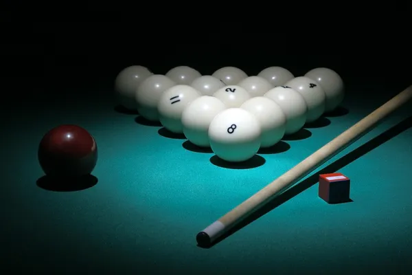 Pool equipment. Balls pyramid with number 8 ball on a foreground