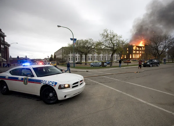 Fire in Building Saskatchewan Police Car