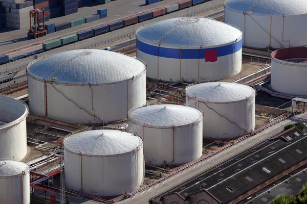 Aerial view of large oil tanks