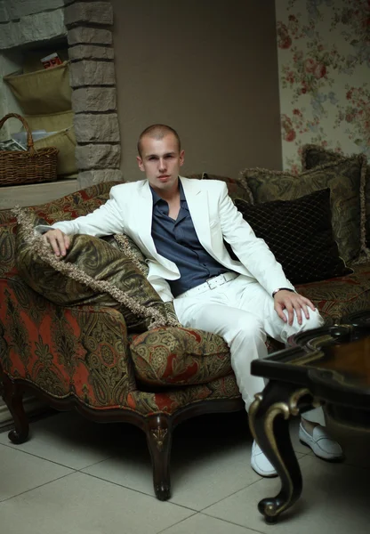 Man in a white suit