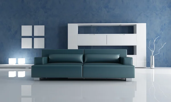 Navy blue couch and white empty bookshelf