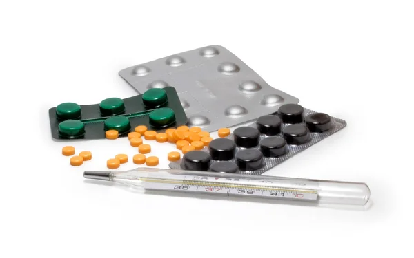 Pills and thermometer