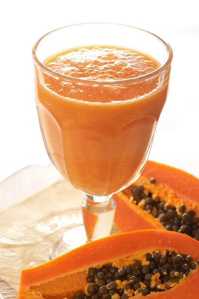 Glass of fresh papaya smoothie