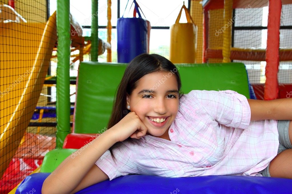 Latin indian teenager girl smiling in playground schoolgirl