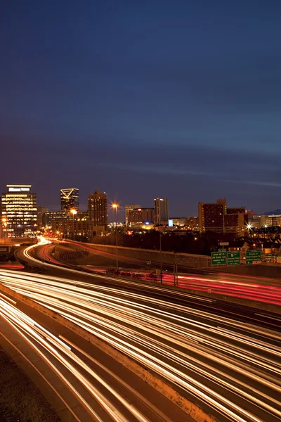 Atlanta twilight skyline showing traffic streaks