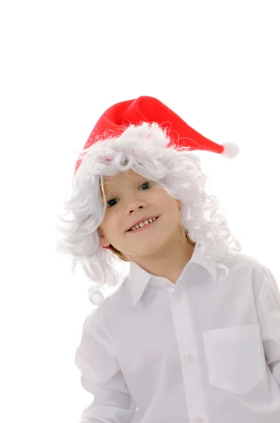 Barn i en hatt jultomten — Stockfoto