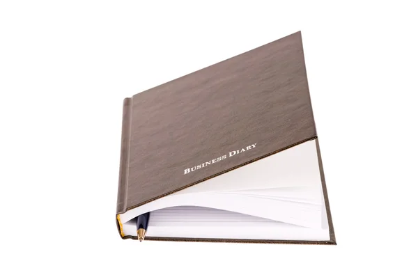 白い背景で隔離のペンで茶色ビジネス日記 — ストック写真