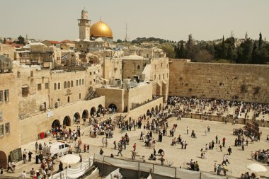 JERUSALEM - APRIL 02: Orthodox Jewish Pray at the Western Wall during the holiday of Passover on April 02 2010 in Jerusalem, Israel. clipart