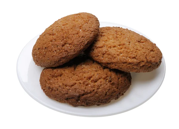 Cookies på en tallrik, isolerade — Stockfoto