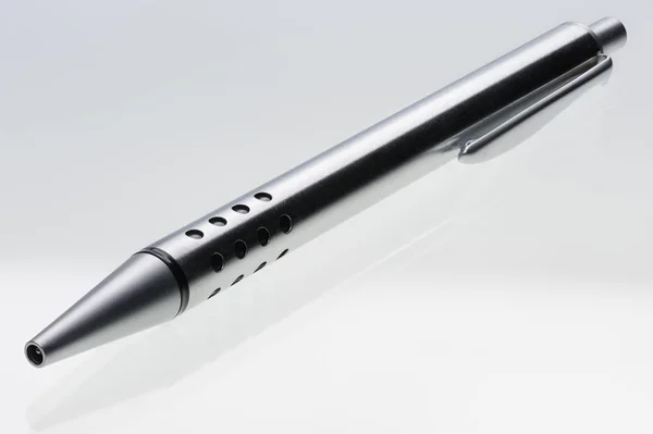 Shiny steel ball-point pen, hyper DoF — Stock Photo, Image
