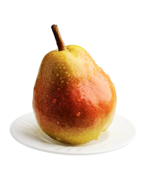 Päron på en vit platta, isolerade — Stockfoto