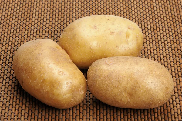 Potatis på en matta — Stockfoto