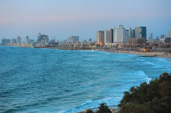 Sea coast and the view of Tel Aviv at the evening — Stock Photo, Image