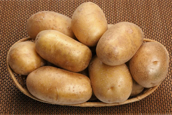 Potatis på en matta — Stockfoto