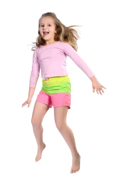 白い背景上に分離されて長いブロンドの髪と明るい服の女の子をジャンプ — ストック写真