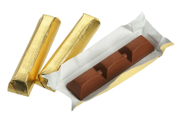 stock image Bars of chocolate in gold foil, isolated on a white background