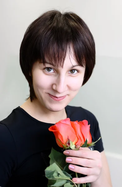 Stock image Smiling girl with roses