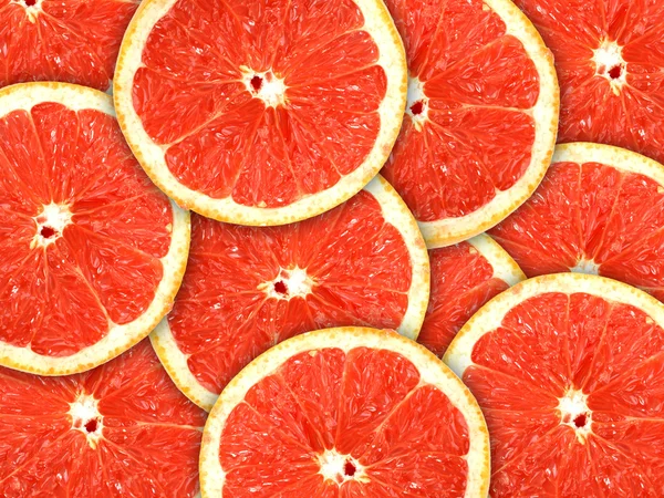 Bakgrund med citrus-frukt grapefrukt skivor — Stockfoto