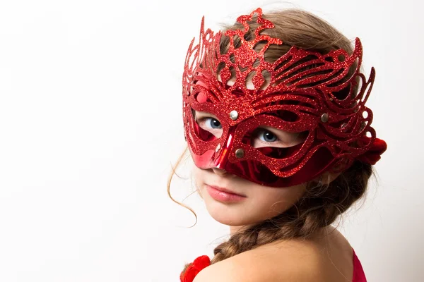 Menina em uma máscara vermelha Imagens Royalty-Free