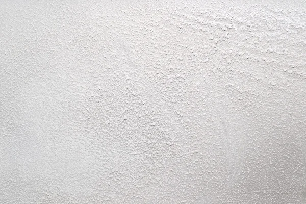 Toz halinde bir madde ile beyaz duvar — Stok fotoğraf