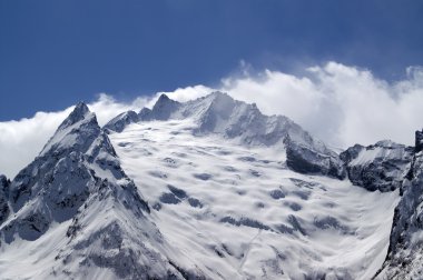 Glacier. Caucasus Mountains, Dombay. clipart