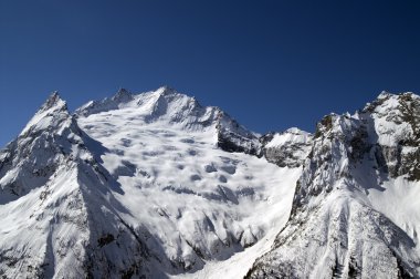 Glacier Dzhuguturlyuchat. Caucasus Mountains. Dombay. clipart