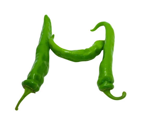 Brief h samengesteld uit groene paprika 's — Stockfoto