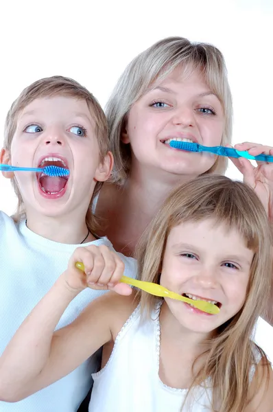 Family cleaning teeth — Stock Photo, Image