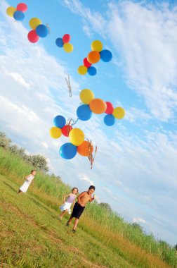 Children running with balloons clipart