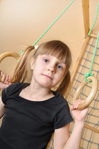 Child at her home sports equipment — Stock Photo, Image