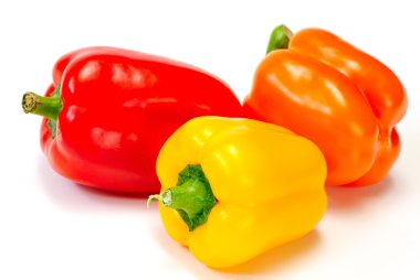 Three fresh sweet pepper isolated on white background clipart