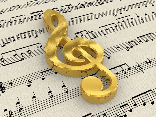 Golden treble clef on score paper — Stock Photo, Image