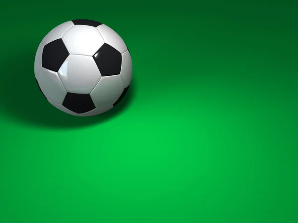 Pelota de fútbol en verde — Foto de Stock