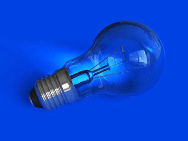 Лампочка на блакитному — стокове фото