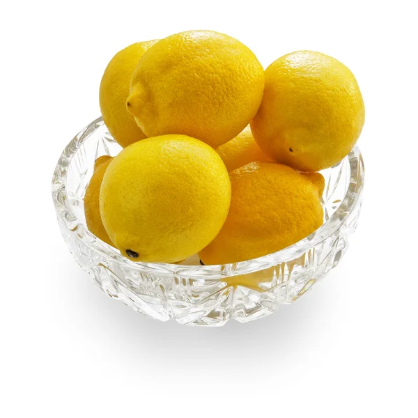 Лимоны в хрустальной чаше — стоковое фото